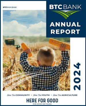 The cover of the 2024 BTC Bank annual report featuring a young boy on the edge of a corn field holding up ears of corn