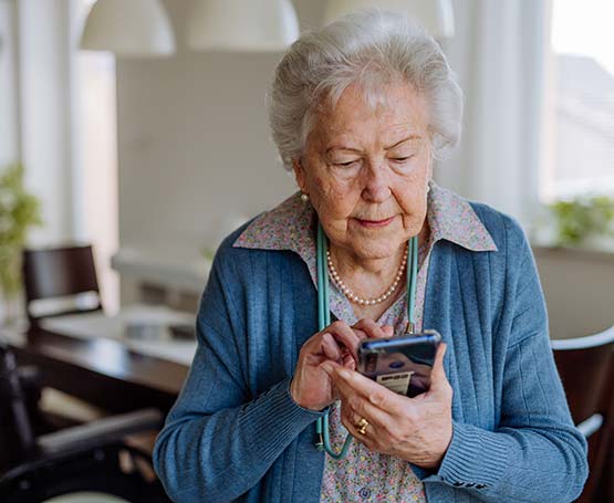 Older woman using cell phone